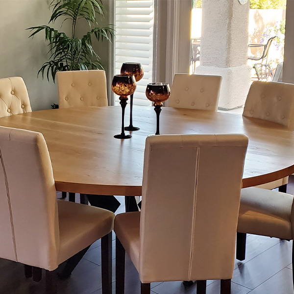 Stunning 72 inch Round Cherry Dining Table with Custom Steel Knee Legs, Set Up After Delivery to Las Vegas Client