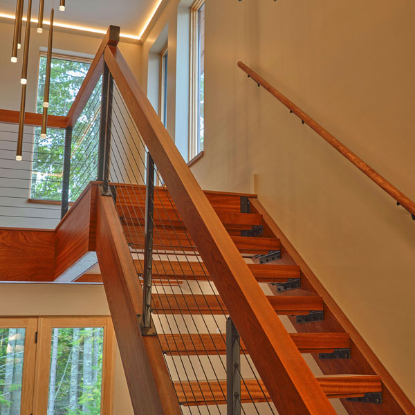 Custom Sapele Mahogany Open Stairway with 2.75&#34; Thick Treads, Stringers, Solid Wood Rail and Cable System