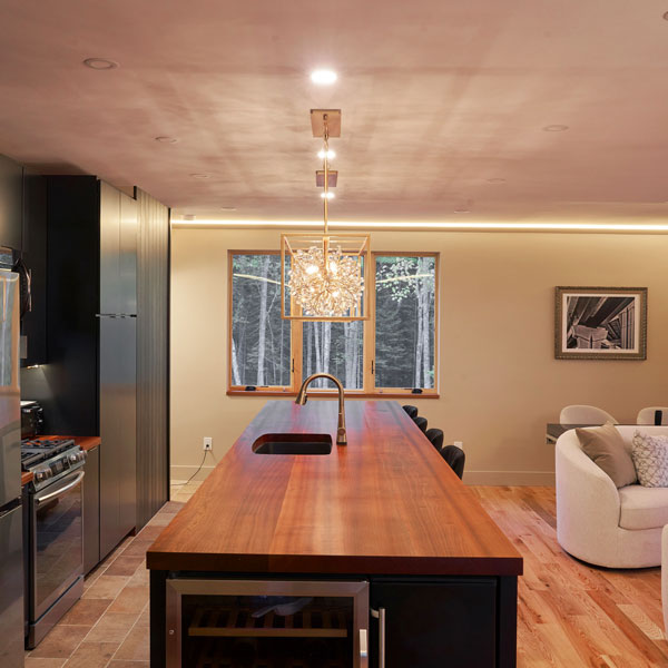 New Custom Sapele Kitchen, Cabinets, Ebonized Wall Cladding and Custom Counter and Island Tops
