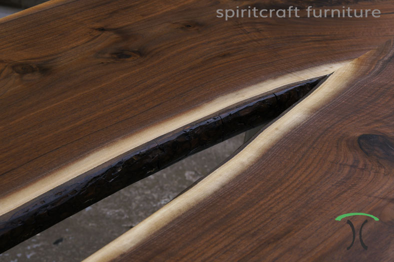 kiln dried black walnut live edge conference table from spiritcraft furniture at Chicago area living edge showroom in dundee, il.