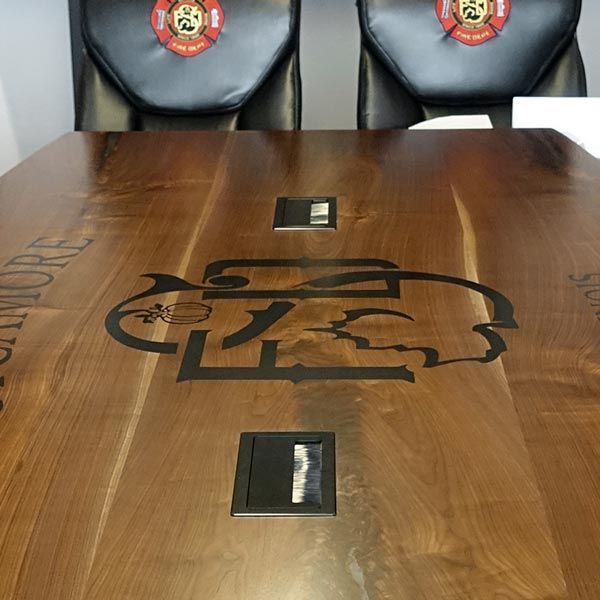 Custom Walnut Boat Shaped Conference Table with Inlay logo for Suburban Chicago Fire Department