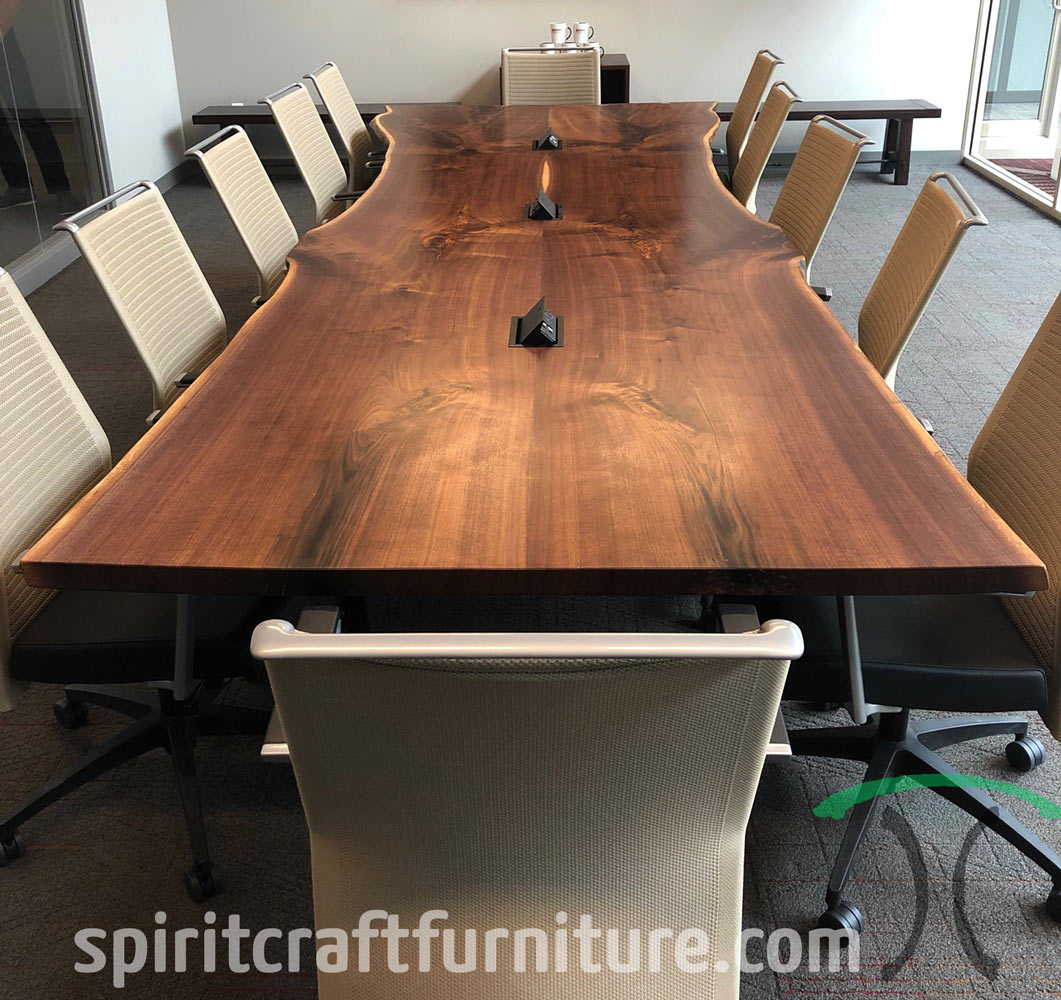 https://spiritcraftfurniture.com/images/conference-tables/large-book-matched-black-walnut-conference-table-with-data-grommets-for-architectural-office.jpg