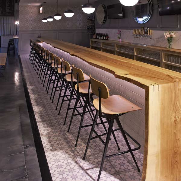 Live edge Ash commercial bartop and restaurant tables for national hospitality furniture client