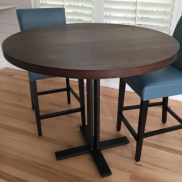 Stained Sapele Round Cafe Table with Double Post Base for North Carolina Muti Family Designer