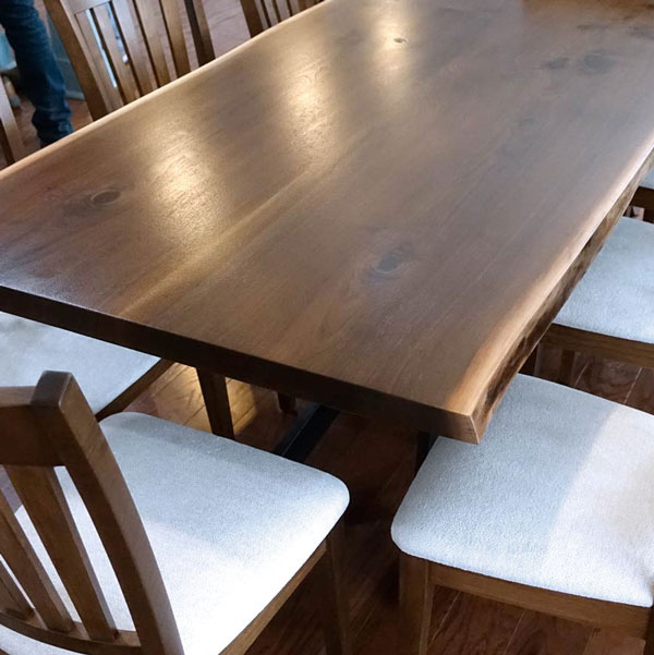 Raw-edge dining table from kiln dried Walnut with RH Yoder dining chairs