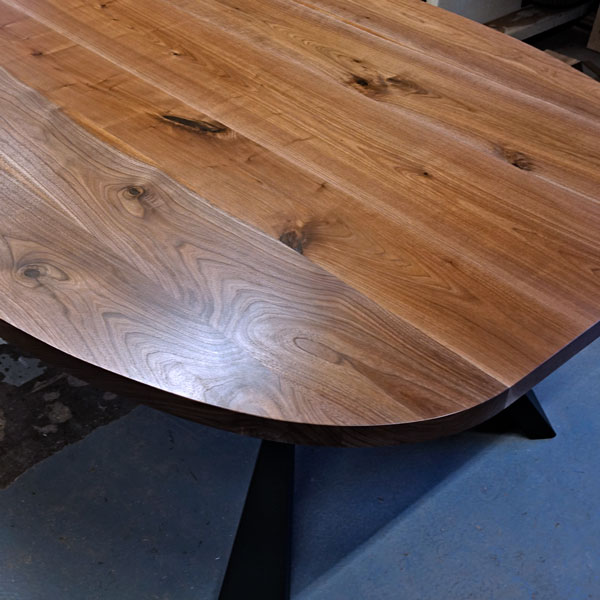 Walnut Modified Oval Dining Table with Geometric Knee Legs for NYC Banquette Instalation