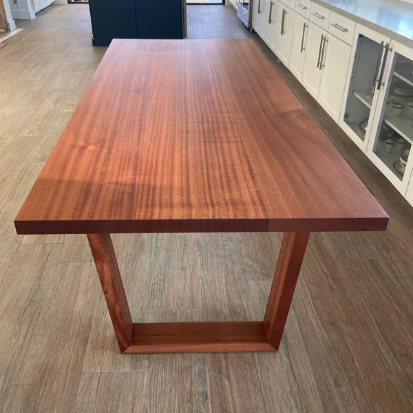 Rectangular Sapele Mahogany dining table with solid wood trapezoid legs