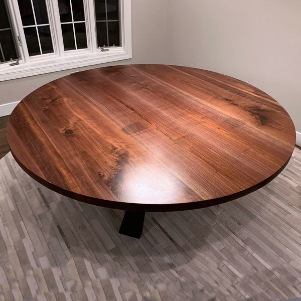 large 72&#34; round black walnut dining table on geometric style knee legs