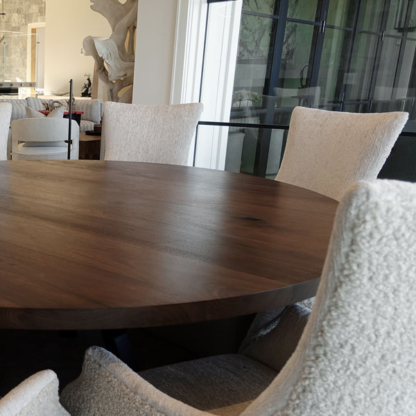 Custom 72 inch Round Black Walnut Dining Table in contemporary open concept home
