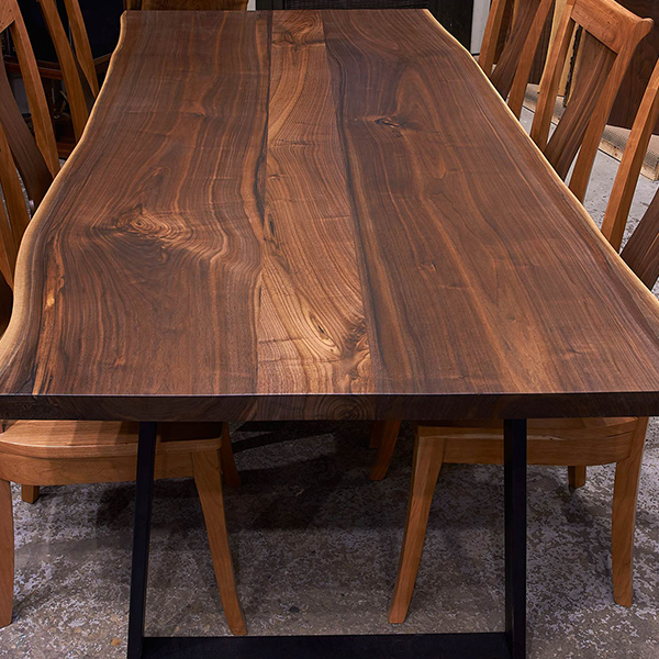 RH Yoder Benjamin Side Chairs in Cherry with Walnut Back Panel and Walnut Live Edge Dining Table Pictured in our Showroom