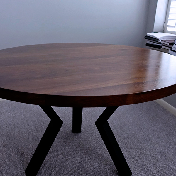 54 inch Round Dining Table in Wide Plank Black Walnut with Tube Style Knee Legs for Chicago Area Client
