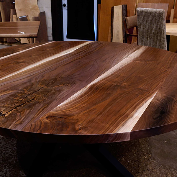 Round 72 inch Dining Table, Crafted from Slabs of Kiln Dried Un-Steamed Walnut, Finished Clear with Steel Modern Art Base