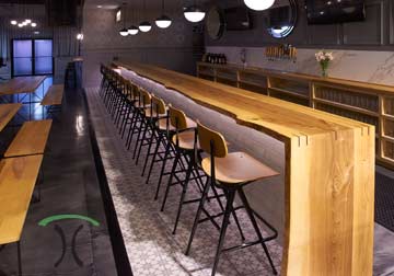 Live Edge Ash Commercial Bar Top, 40 Feet Long in Edge Matched Sections with Waterfall for Hospitality, Brew Pub Client