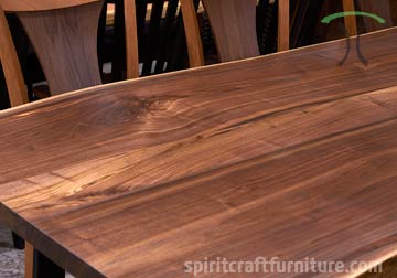 Black Walnut live edge dining table and  with R.H. Yoder Benjamin Cherry and Walnut dining chairs at Spiritcraft Furniture, East Dundee, IL.