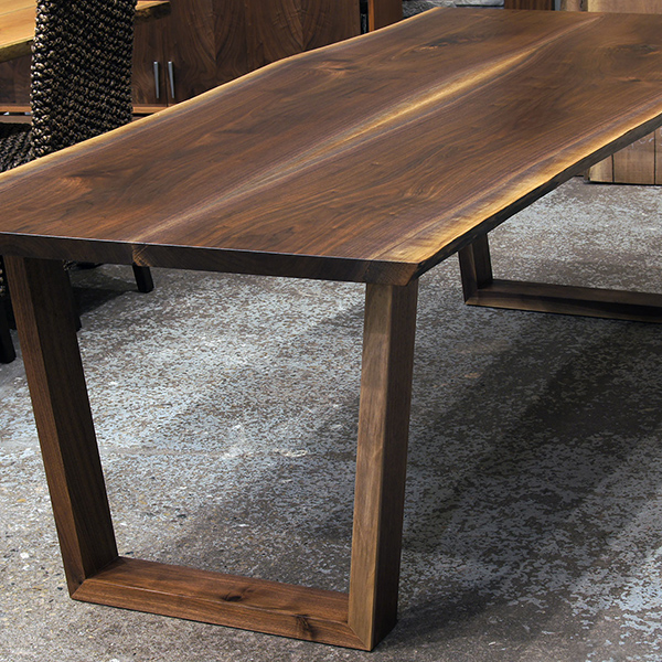 Book Matched 96 inch by 40 inch Walnut Live Edge Dining Table with Solid Hardwood Trapezoid Legs in our Chicago Area Live Edge Furniture Showroom