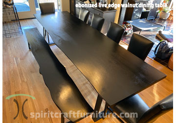 Custom made live edge dining table with ebonized walnut slabs by Spiritcraft Furniture in East Dundee, IL