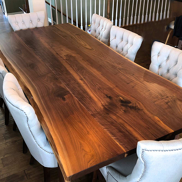 Walnut Live Edge Dining Table Fabricated Using Three Slabs from the Same Tree, Shown with Our Open Base Hardwood Legs that Maximize Seating Capacity