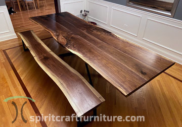 Eleven Foot Long Live Edge Dining Table with Spider Base and Matching Bench from Dundee, IL Furniture Showroom