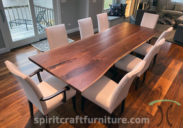 Live Edge Black Walnut dining room table with spider base for Chicago area client by Spiritcraft Furniture in East Dundee, Illinois.