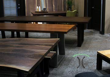 Heirloom quality dining and conference tables and desks on hardwood, stainless and black steel legs in Sapele Mahogany, Black Walnut and Cherry at our Chicago area furniture Company in East Dundee, IL.