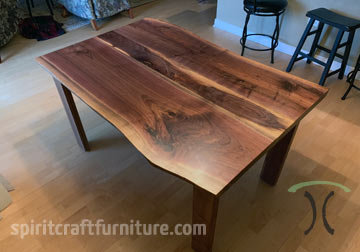 Live Edge Walnut Three Slab Dining Table, Organic Look with Sapwood Visible in Center, Shown with Open U Shaped Hardwood Legs for Maximum Seating