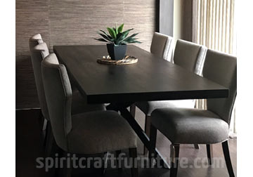 Thick and wide plank Black Walnut dining table with spider base and RH Yoder chairs in East Dundee, Illinois.