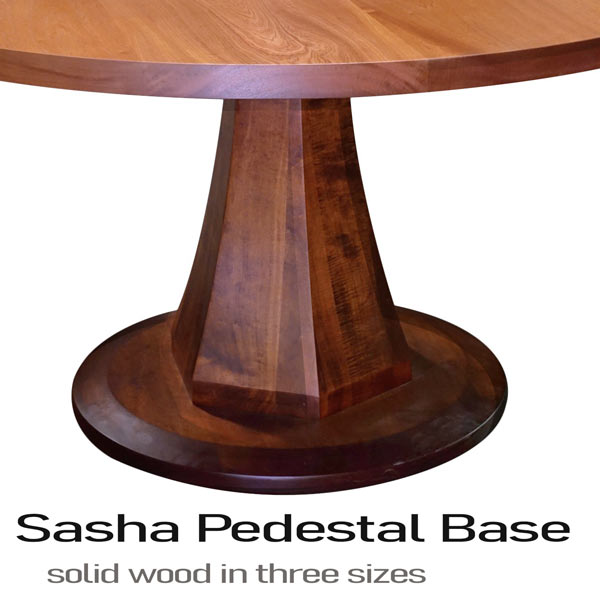 Round dining table in sapele mohogany on sasha base