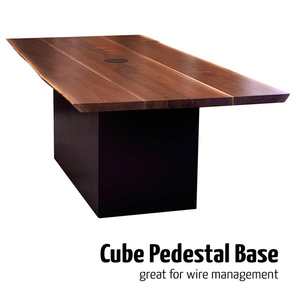 Walnut live edge conference table on cube pedestal base with power and data grommet