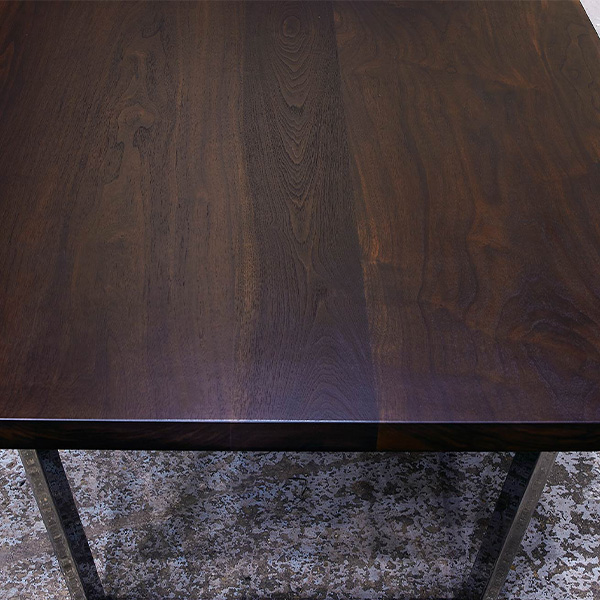 Wide Plank Black Walnut Stained Ebony with Trapezoid Legs for Chicago Client from Spiritcraft Furniture of Dundee, IL