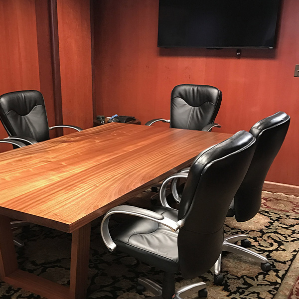 Sapele Mahogany Table with Solid Wood Trapezoid Legs for Northbrook, Illinois Home Office Client